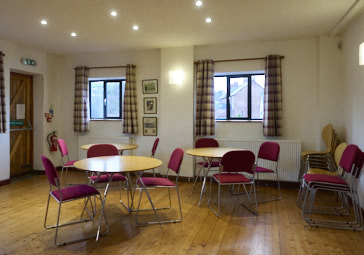 image of cafe room with tables and chairs